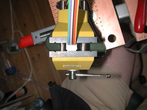 manually crimping a connector in a vice