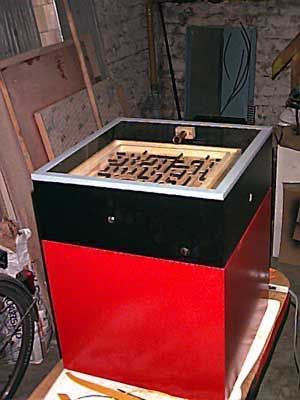 two part wooden box, black and red paint